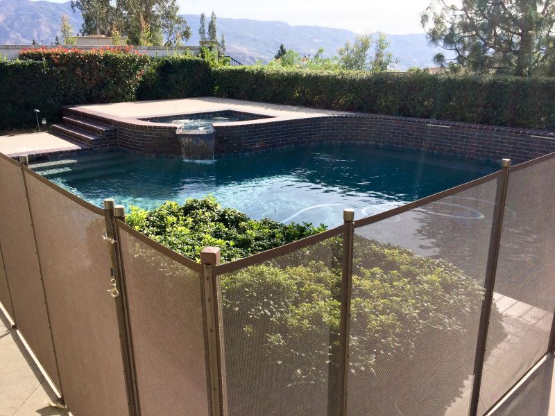 Mesh Pool Safety Fence in Place